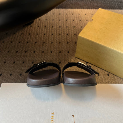 THE ROW 26S BUCKLE SLIDE SANDALS IN BLACK CALFSKIN