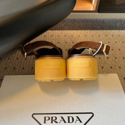 PRADA 26S CROSS STRAP PLATFORM SANDALS 55MM IN BROWN SUEDE