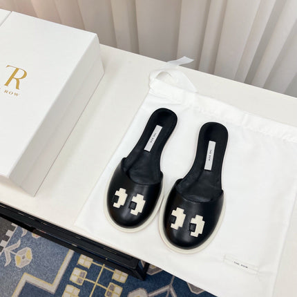 THE ROW 26S PIXEL APPLIQUE MULES IN BLACK CALFSKIN