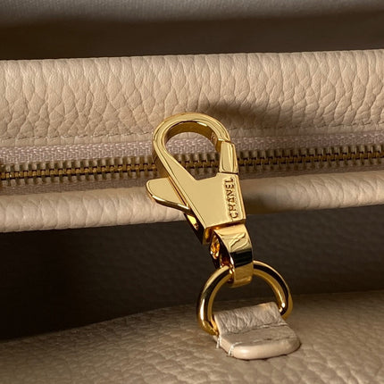 CHANEL 26S BOWLING BAGUETTE BAG 30CM IN BEIGE CAVIAR CALFSKIN