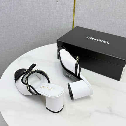 CHANEL 26S HIGH HEEL MULES 45 MM IN WHITE AND BLACK LAMBSKIN