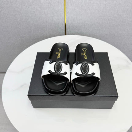 CHANEL 26S ICONIC CC SLIDES IN WHITE LAMBSKIN