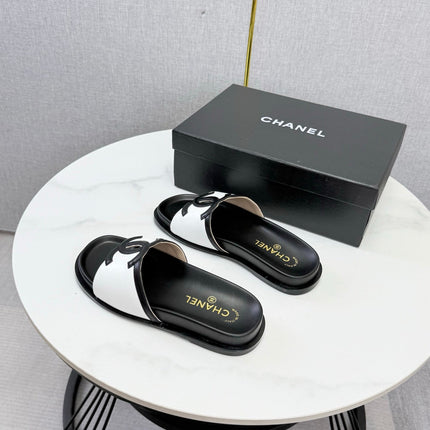 CHANEL 26S ICONIC CC SLIDES IN WHITE LAMBSKIN