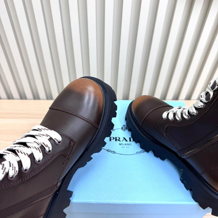 PRADA 25S MONOLITH BOOTS IN DARK BROWN CALFSKIN