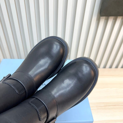 PRADA 25S MARTIN BOOTS IN BLACK CALFSKIN FUR-LINED