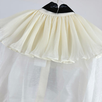 WHITE DRESSY TOP WITH BLACK TIE-NECK