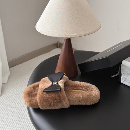 CHANEL 26S SLIDE SANDALS IN BROWN SHEARLING WITH BLACK BOW