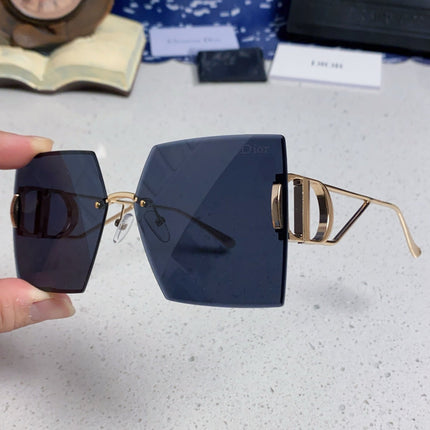 30MONTAIGNE S7U SUNGLASS 578110 IN GOLD METAL GREY LENSES