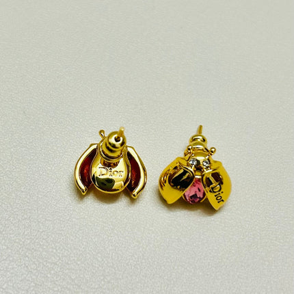 CD 26S LADYBUG PINK CRYSTAL STUD EARRINGS IN GOLD TONE METAL 644370