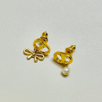 CD 26S MINI BOW PEARL DROP EARRINGS IN GOLD TONE METAL 646612