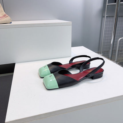 CHANEL 26S FLAT SLINGBACK IN BLACK LAMBSKIN WITH MINT GREEN CAP TOE