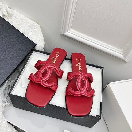 CHANEL CC LOGO MULES IN RED CALFSKIN