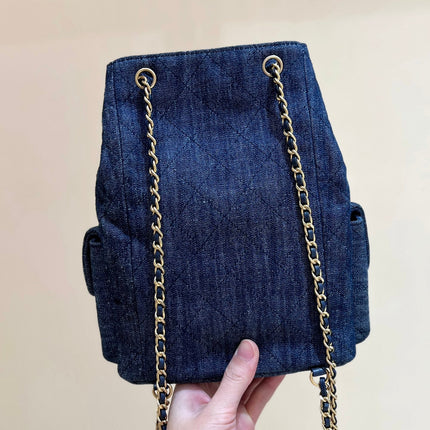 DRAWSTRING BUCKET BACKPACK 24 IN DARK BLUE DENIM GOLD HARDWARE