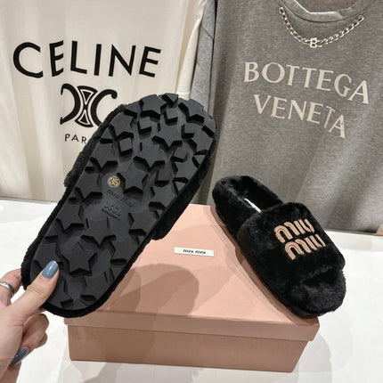 MIUMIU 26S FLAT SLIDES IN BLACK SHEARLING