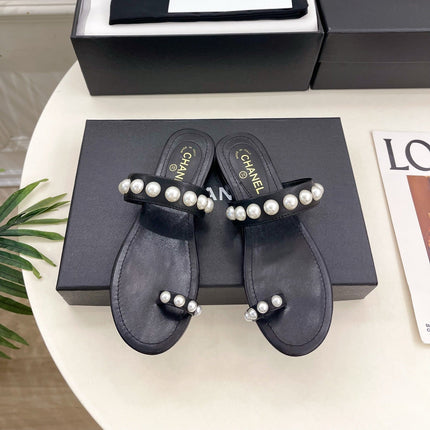 CHANEL 26S THONG SANDALS IN BLACK LAMBSKIN WITH PEARL EMBELLISHMENTS